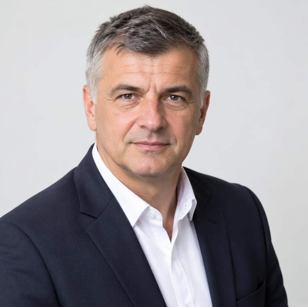 Studio portrait of a Croatian man in a suit